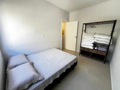 Uma cama ou camas num quarto em Cobertura Duplex com vista para o Mar de Bombinhas