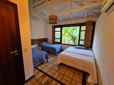 Uma cama ou camas num quarto em Vista única
