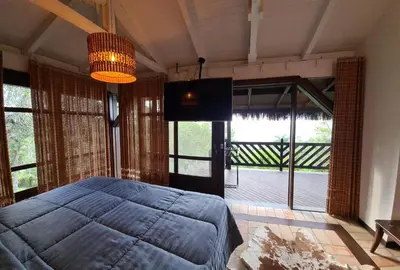 Uma cama ou camas num quarto em Vista única