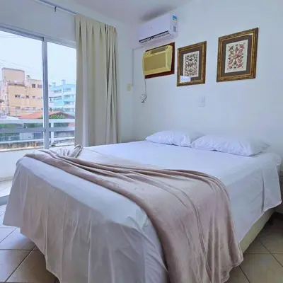 Uma cama ou camas num quarto em Casa com Jacuzzi em Bombas