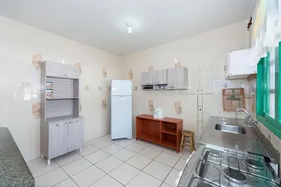 A cozinha ou kitchenette de #01-Z - (Refúgio e Mar) Hospedagem em Canto Grande, Bombinhas