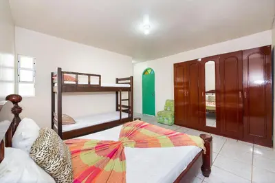 Uma cama ou camas num quarto em #01-Z - (Refúgio e Mar) Hospedagem em Canto Grande, Bombinhas