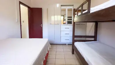 Uma cama ou camas num quarto em #04-M - (Refúgio e Mar) Hospedagem em Canto Grande, Bombinhas