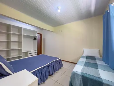 Uma cama ou camas num quarto em #06-B - (Refúgio e Mar) Hospedagem em Canto Grande, Bombinhas