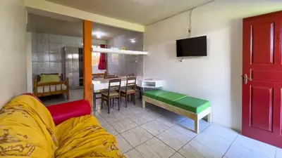 Uma televisão e/ou sistema de entretenimento em #09-M - (Refúgio e Mar) Hospedagem em Canto Grande, Bombinhas