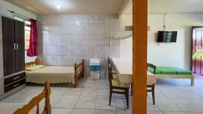 Uma cama ou camas num quarto em #09-M - (Refúgio e Mar) Hospedagem em Canto Grande, Bombinhas