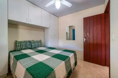 Uma cama ou camas num quarto em #11-CC - (Refúgio e Mar) Hospedagem em Canto Grande, Bombinhas
