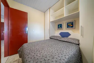 Uma cama ou camas num quarto em #14-T - (Refúgio e Mar) Hospedagem em Canto Grande, Bombinhas