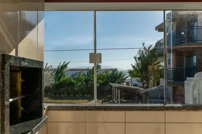 Uma varanda ou terraço em #14-T - (Refúgio e Mar) Hospedagem em Canto Grande, Bombinhas