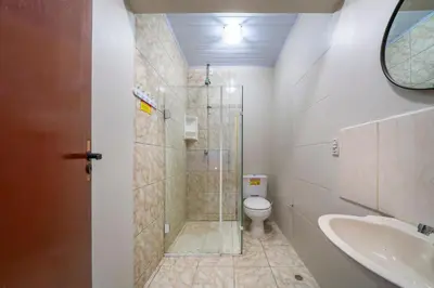 Uma casa de banho em #15-T - (Refúgio e Mar) Hospedagem em Canto Grande, Bombinhas