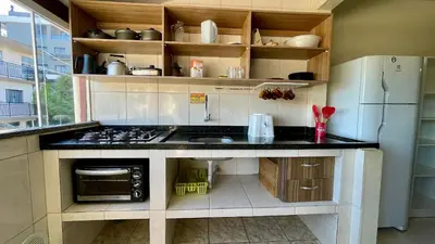 A cozinha ou kitchenette de #15-T - (Refúgio e Mar) Hospedagem em Canto Grande, Bombinhas