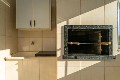 A cozinha ou kitchenette de #16-T - (Refúgio e Mar) Hospedagem em Canto Grande, Bombinhas