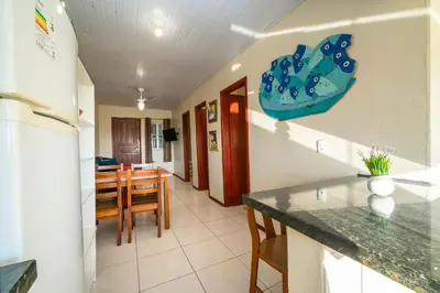 A cozinha ou kitchenette de #17-T - (Refúgio e Mar) Hospedagem em Canto Grande, Bombinhas