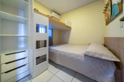 Uma cama ou camas num quarto em #17-T - (Refúgio e Mar) Hospedagem em Canto Grande, Bombinhas