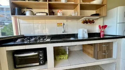 A cozinha ou kitchenette de #17-T - (Refúgio e Mar) Hospedagem em Canto Grande, Bombinhas