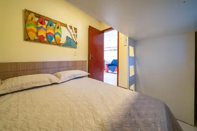 Uma cama ou camas num quarto em #18-T - (Refúgio e Mar) Hospedagem em Canto Grande, Bombinhas