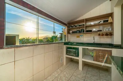 A cozinha ou kitchenette de #19-T - (Refúgio e Mar) Hospedagem em Canto Grande, Bombinhas