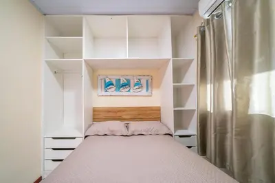 Uma cama ou camas num quarto em #19-T - (Refúgio e Mar) Hospedagem em Canto Grande, Bombinhas