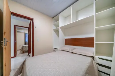 Uma cama ou camas num quarto em #20-T - (Refúgio e Mar) Hospedagem em Canto Grande, Bombinhas