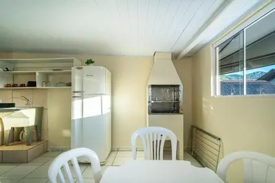 A cozinha ou kitchenette de #20-T - (Refúgio e Mar) Hospedagem em Canto Grande, Bombinhas