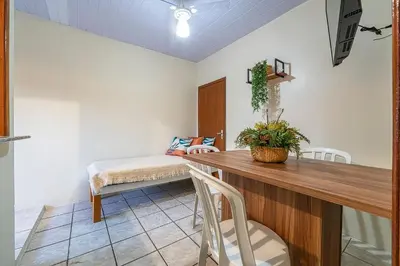 Uma cama ou camas num quarto em #24-CG - (Refúgio e Mar) Hospedagem em Canto Grande, Bombinhas