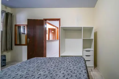 Uma cama ou camas num quarto em #24-CG - (Refúgio e Mar) Hospedagem em Canto Grande, Bombinhas