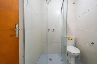 Uma casa de banho em #25-CG - (Refúgio e Mar) Hospedagem em Canto Grande, Bombinhas