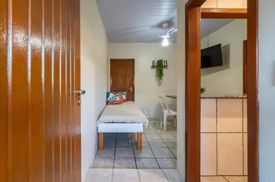 Uma cama ou camas num quarto em #26-CG - (Refúgio e Mar) Hospedagem em Canto Grande, Bombinhas