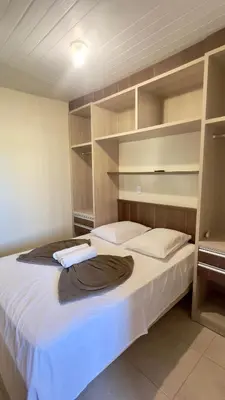 Uma cama ou camas num quarto em #27-CG - (Refúgio e Mar) Hospedagem em Canto Grande, Bombinhas