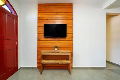 Uma televisão e/ou sistema de entretenimento em #28-Z - (Refúgio e Mar) Hospedagem em Canto Grande, Bombinhas