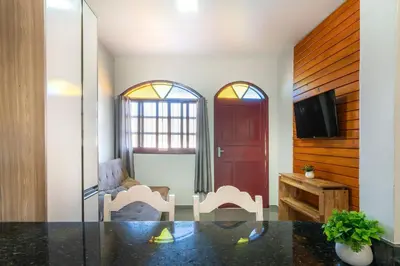 Uma televisão e/ou sistema de entretenimento em #28-Z - (Refúgio e Mar) Hospedagem em Canto Grande, Bombinhas