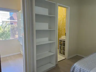 Uma cama ou camas num quarto em #30-E - (Refúgio e Mar) Hospedagem em Canto Grande, Bombinhas