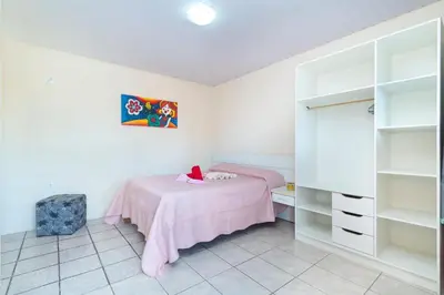 Uma cama ou camas num quarto em #36-MA - (Refúgio e Mar) Hospedagem em Canto Grande, Bombinhas