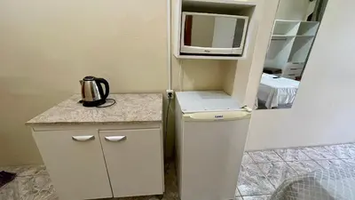 A cozinha ou kitchenette de #38-MA - (Refúgio e Mar) Hospedagem em Canto Grande, Bombinhas