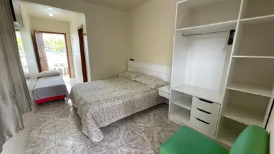 Uma cama ou camas num quarto em #39-CG - (Refúgio e Mar) Hospedagem em Canto Grande, Bombinhas