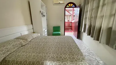 Uma cama ou camas num quarto em #39-CG - (Refúgio e Mar) Hospedagem em Canto Grande, Bombinhas
