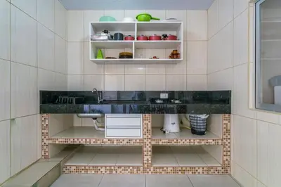 A cozinha ou kitchenette de #03A-M - (Refúgio e Mar) Hospedagem em Canto Grande, Bombinhas