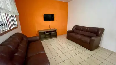 Uma área de estar em #03B-M - (Refúgio e Mar) Hospedagem em Canto Grande, Bombinhas