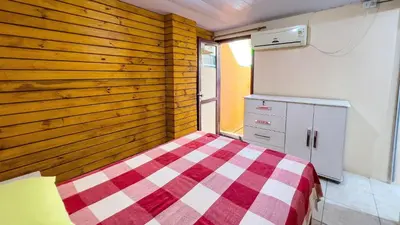 Uma cama ou camas num quarto em #40-B - (Refúgio e Mar) Hospedagem em Canto Grande, Bombinhas