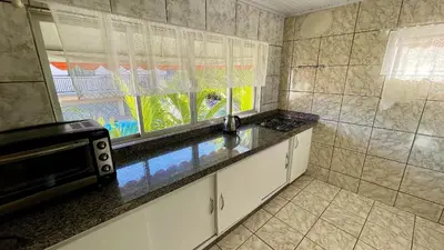 A cozinha ou kitchenette de #44-CG - (Refúgio e Mar) Hospedagem em Canto Grande, Bombinhas