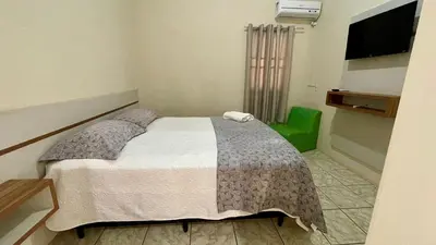 Uma cama ou camas num quarto em #44-CG - (Refúgio e Mar) Hospedagem em Canto Grande, Bombinhas