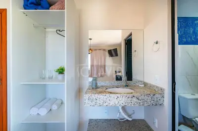 Uma casa de banho em Suíte 1 (Ala pôr do sol) - Residencial Solavir