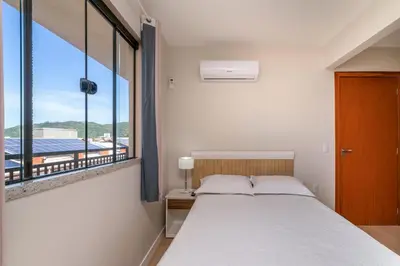 Uma cama ou camas num quarto em #PDS4 - (Refúgio e Mar) Hospedagem em Canto Grande, Bombinhas