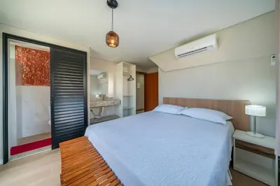 Uma cama ou camas num quarto em #PDS6 - (Refúgio e Mar) Hospedagem em Canto Grande, Bombinhas