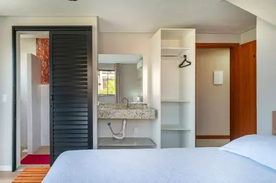 Uma cama ou camas num quarto em #PDS6 - (Refúgio e Mar) Hospedagem em Canto Grande, Bombinhas