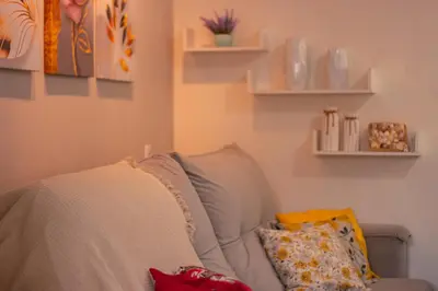 Uma cama ou camas num quarto em Apartamento Casal Flores de Bombinhas