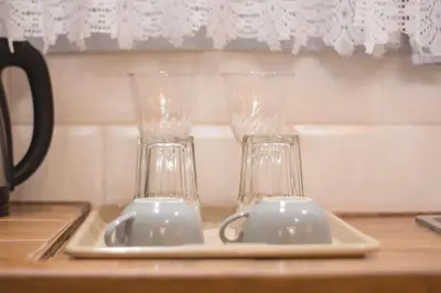 Comodidades para chá e café em Apartamento Casal Flores de Bombinhas