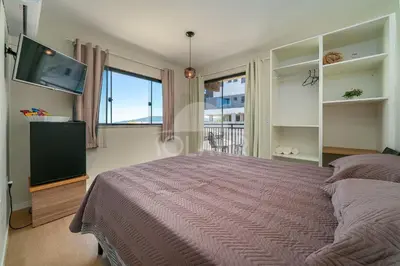 Uma cama ou camas num quarto em #PDS2 - (Refúgio e Mar) Hospedagem em Canto Grande, Bombinhas