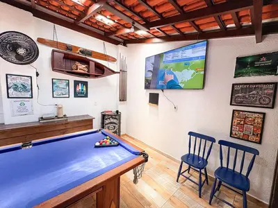 A planta de CASA FOCA 271 - piscina privativa, mesa de sinuca e pebolim, churrasqueira