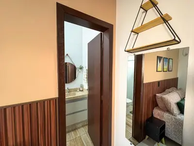Uma cama ou camas num quarto em Quarto 3 - Hospedagem com café da manhã delicioso